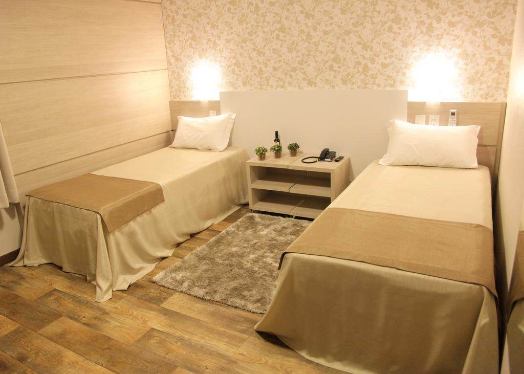 Quarto Standard com Cama de Casal ou 2 de Solteiro