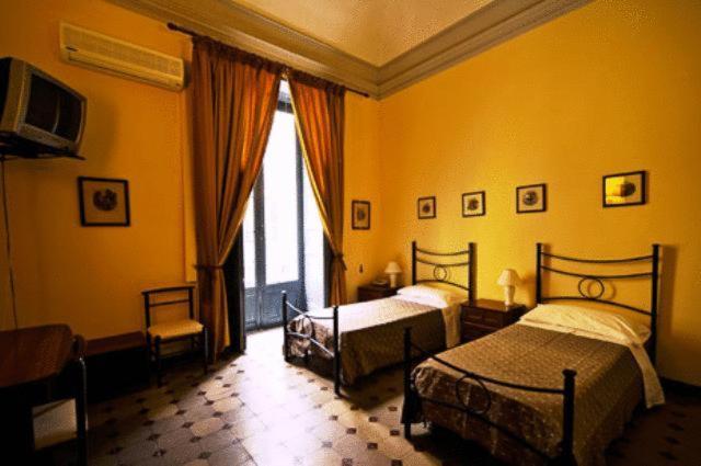 Camera Doppia con Letti Singoli