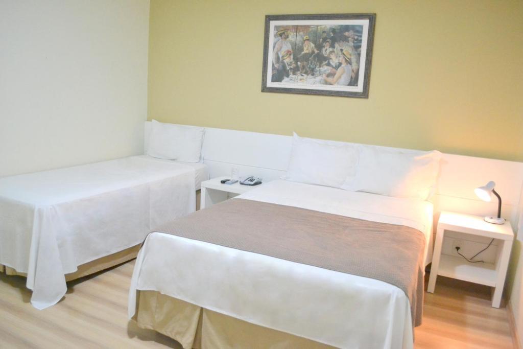 Quarto Triplo Executivo