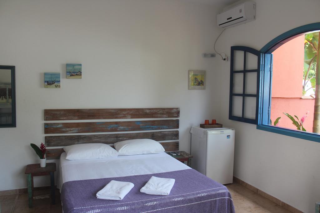 Quarto Triplo com Banheiro Privativo