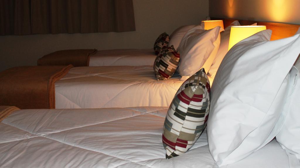 Quarto com Varanda.