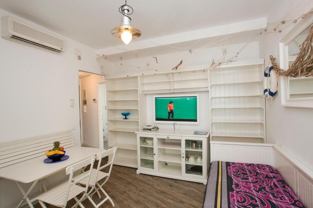 Appartamento con 1 Camera da Letto, Terrazza e Accesso Spiaggia