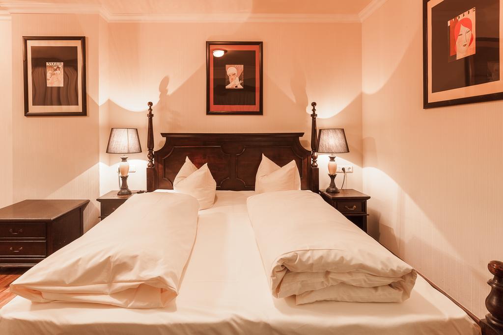 Junior Suite mit Doppelbett – Innenhofseite