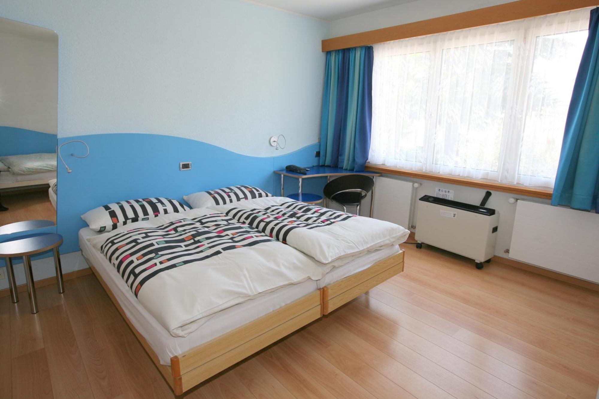 Dreibettzimmer