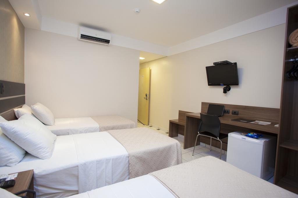 Quarto Triplo Premium