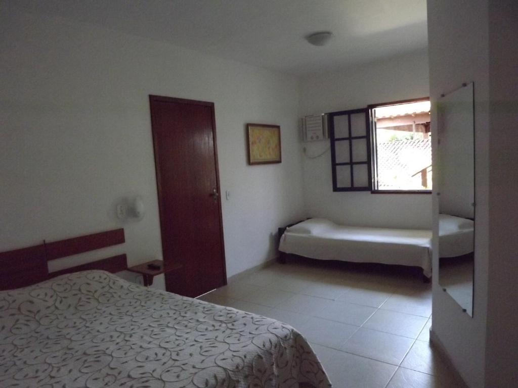 Quarto Triplo com Ar-condicionado