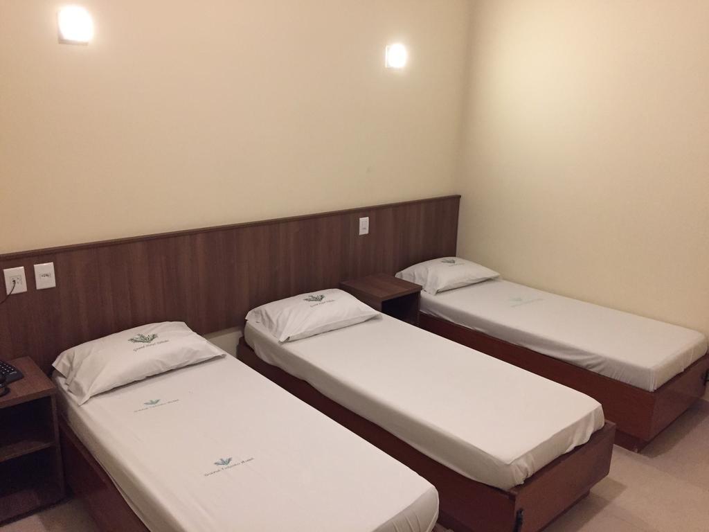Quarto Triplo Executivo