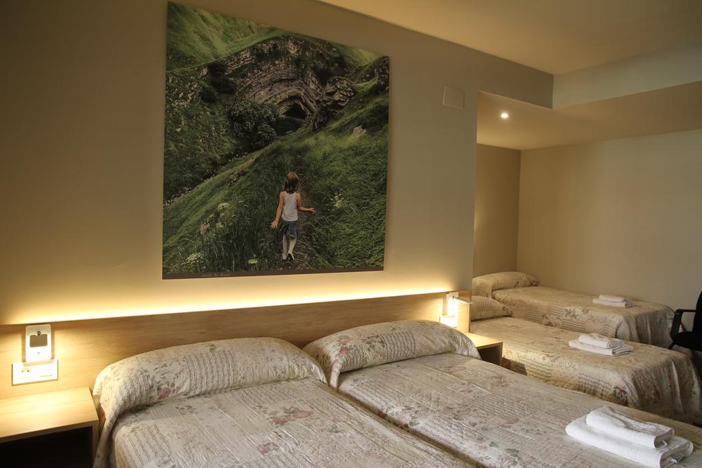 Habitación Cuádruple Económica con baño compartido