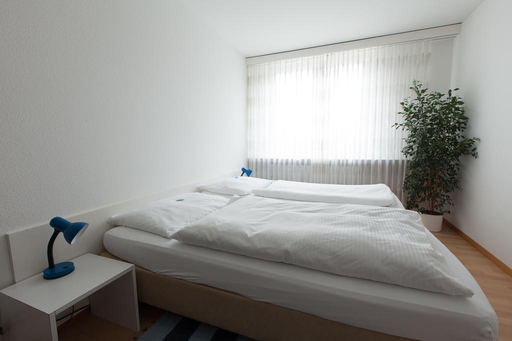 Chambre Lits Jumeaux avec Salle de Bains Commune