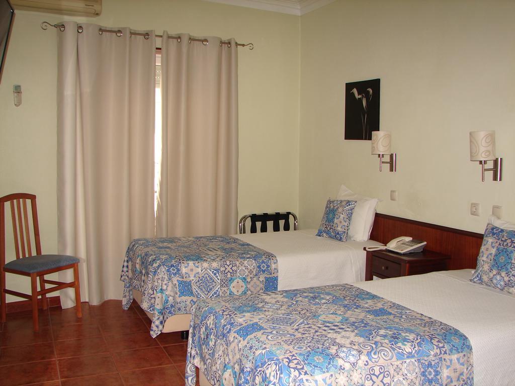 Quarto Twin com Cama Extra