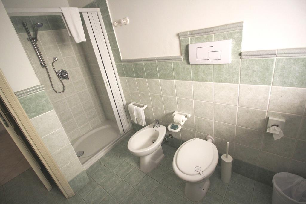 Quarto Quádruplo com Banheiro Privativo