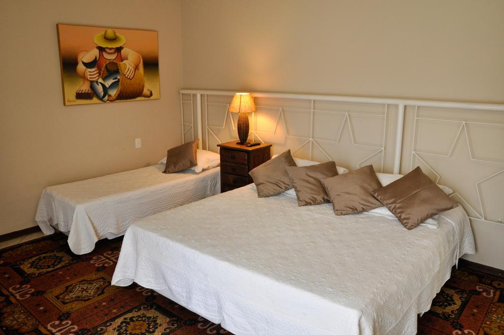 Quarto Triplo com Varanda