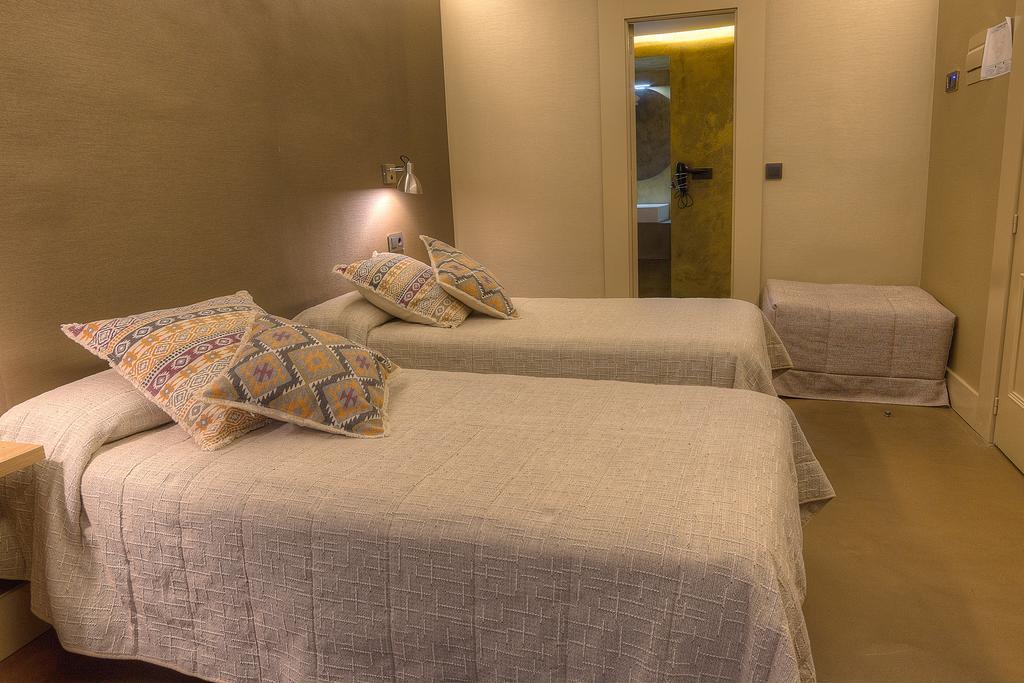 Camera Doppia con Letti Singoli con Letto Supplementare