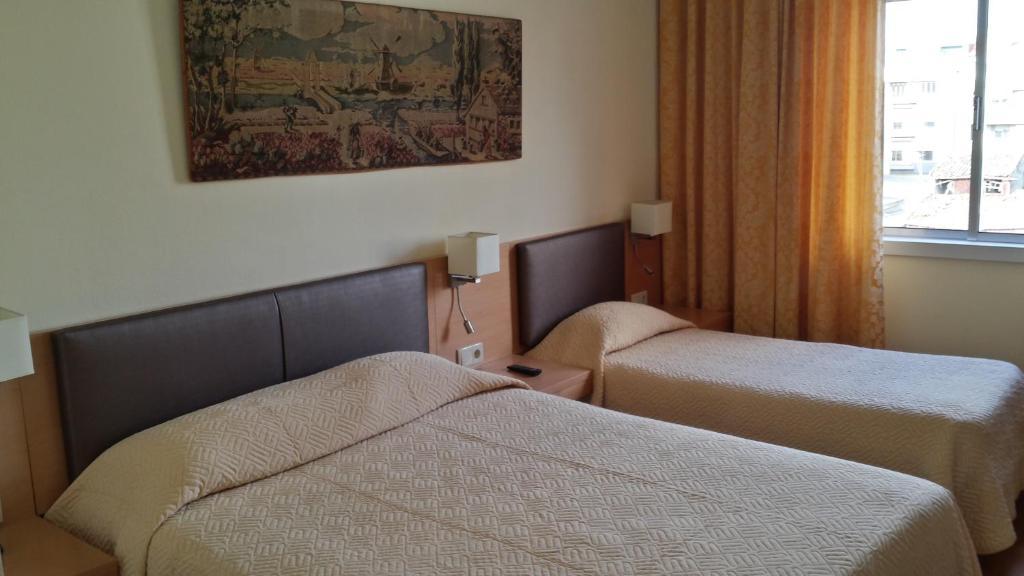 Quarto Triplo com Cama Extra