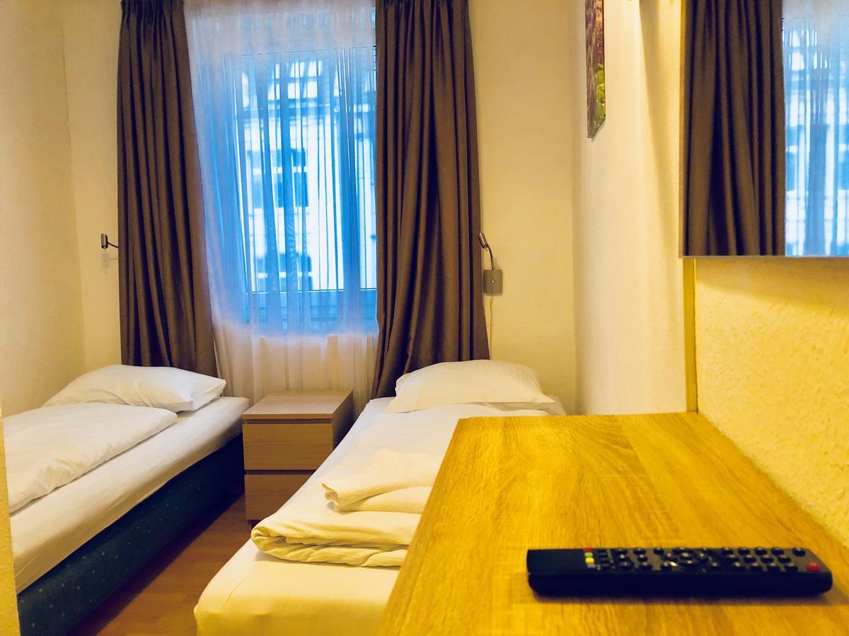 Tweepersoonskamer met 2 Aparte Bedden