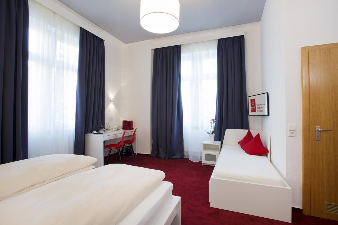 Dreibettzimmer