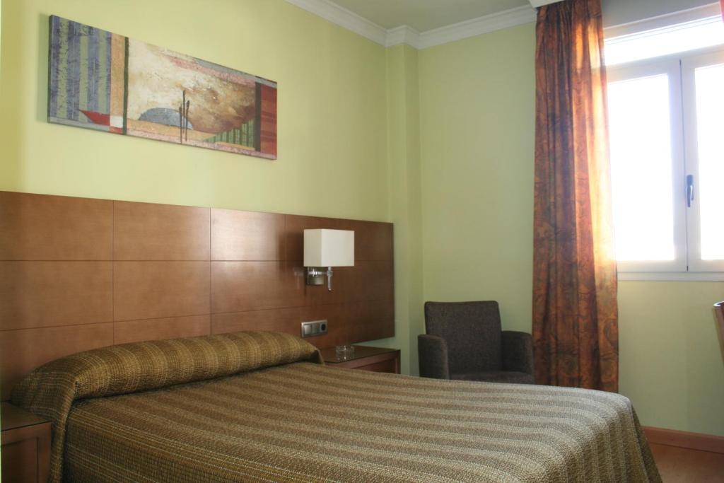 Quarto Duplo com Cama Extra