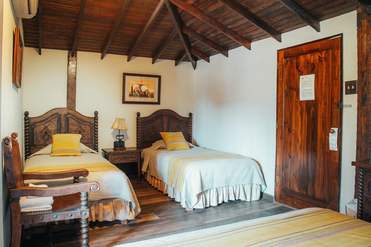 Kolonial Dreibettzimmer