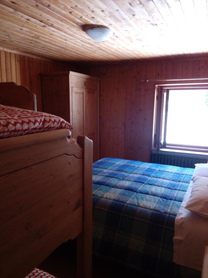 Camera Quadrupla con Bagno in Comune