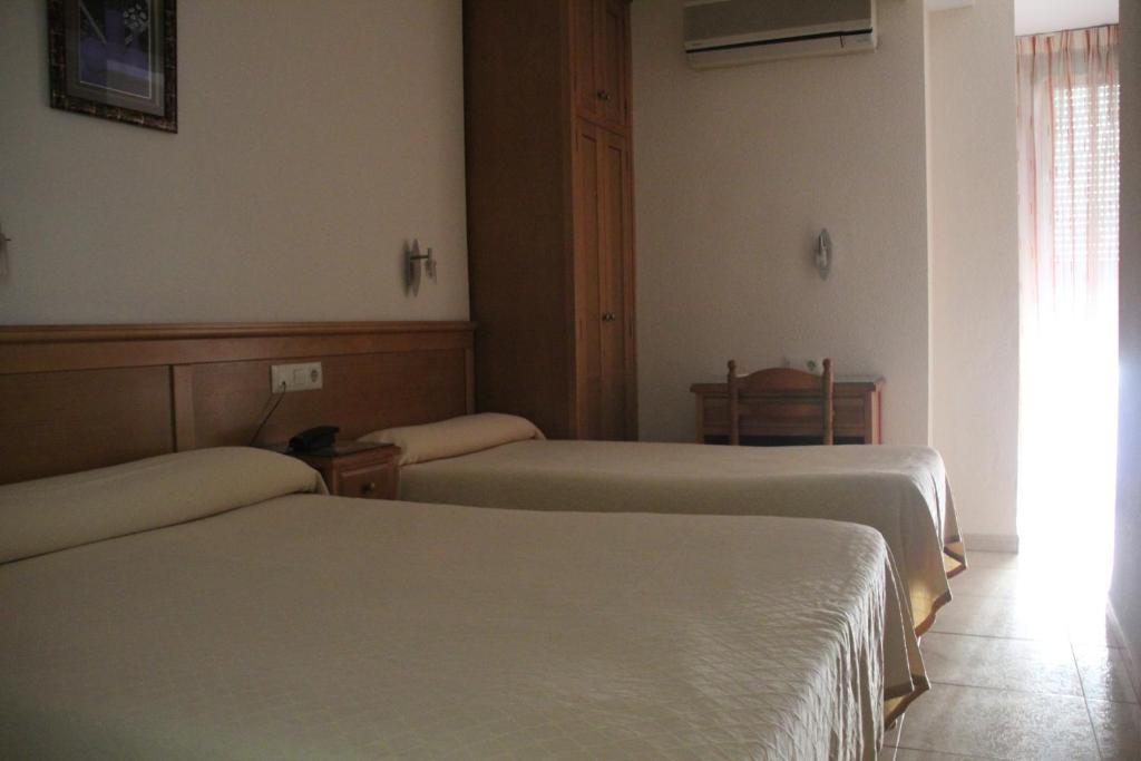 Habitación Doble (2 adultos + 1 niño)
