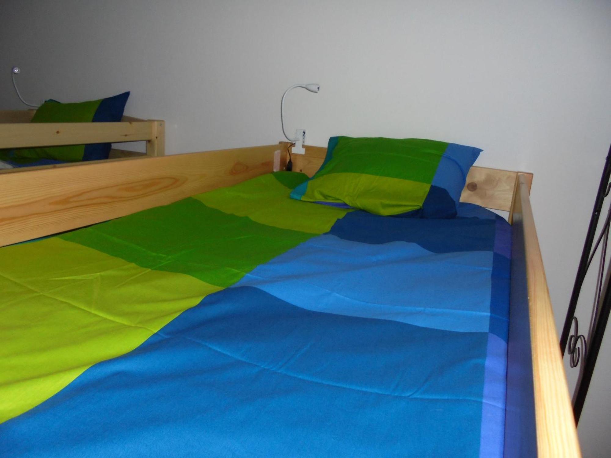 Cama em Beliche num Dormitório Misto