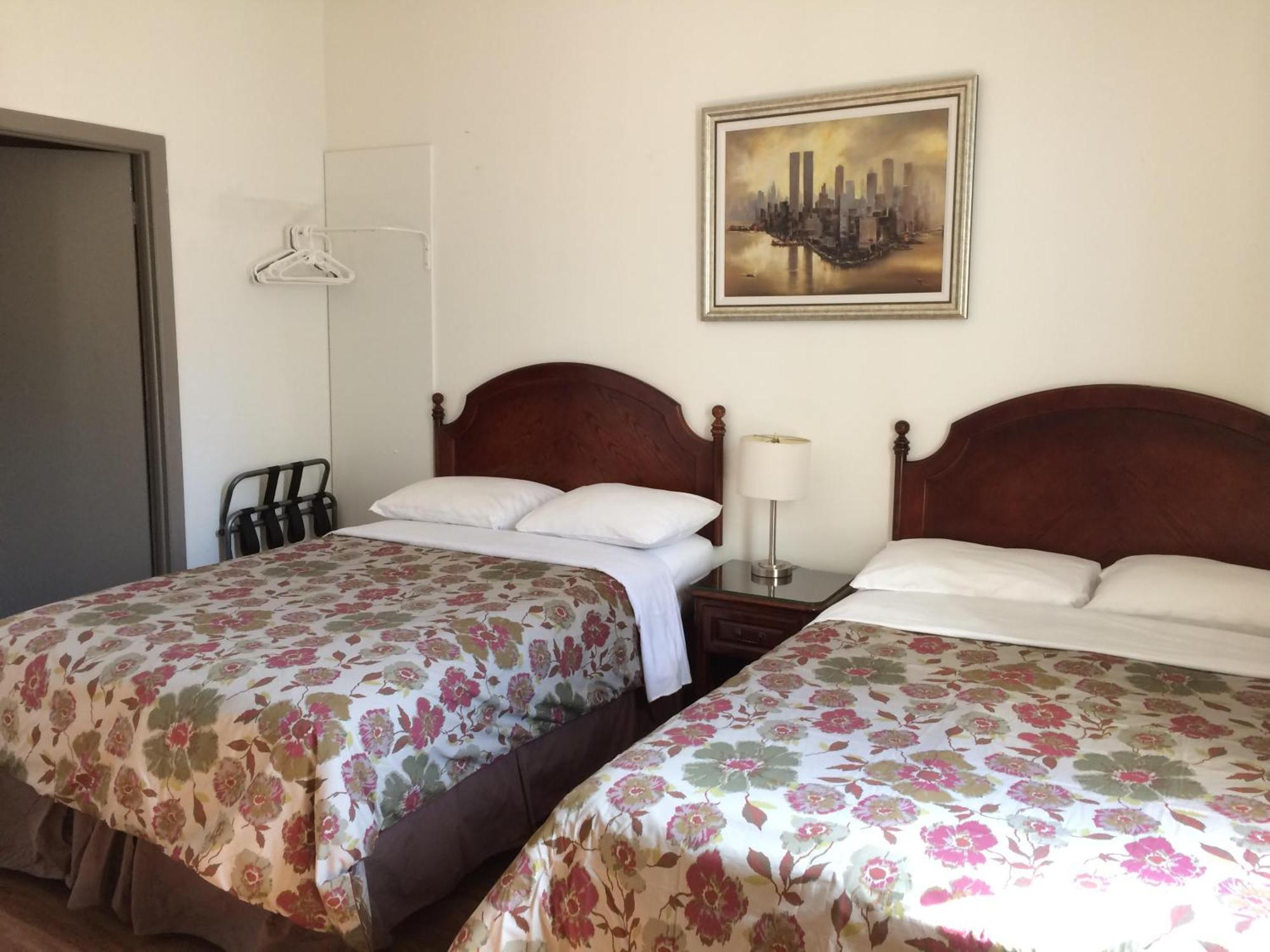 Tweepersoonskamer met 2 Tweepersoonsbedden
