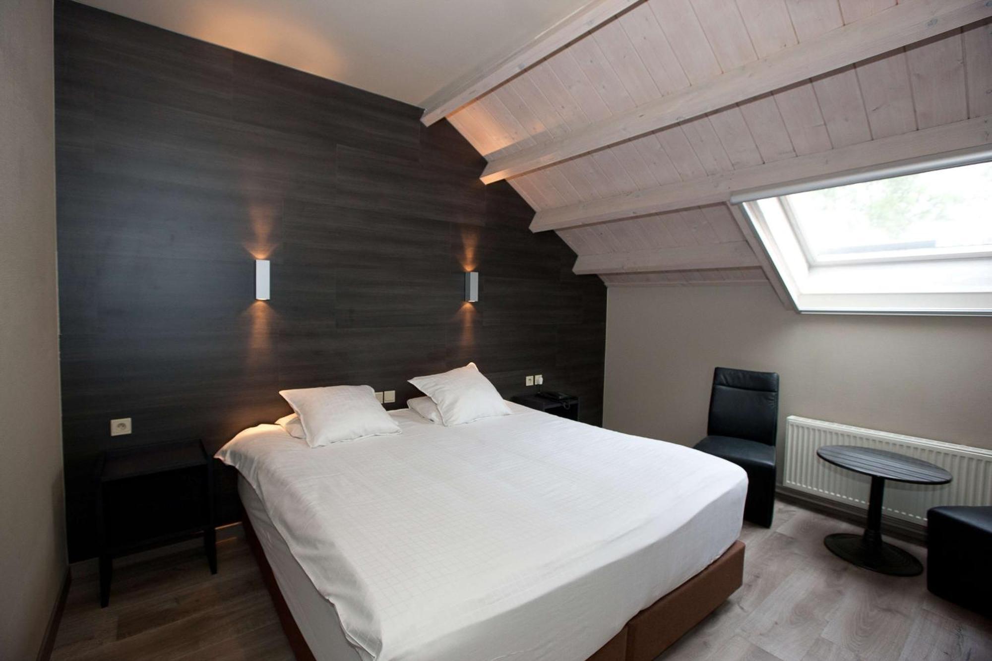 Kamer met Kingsize Bed