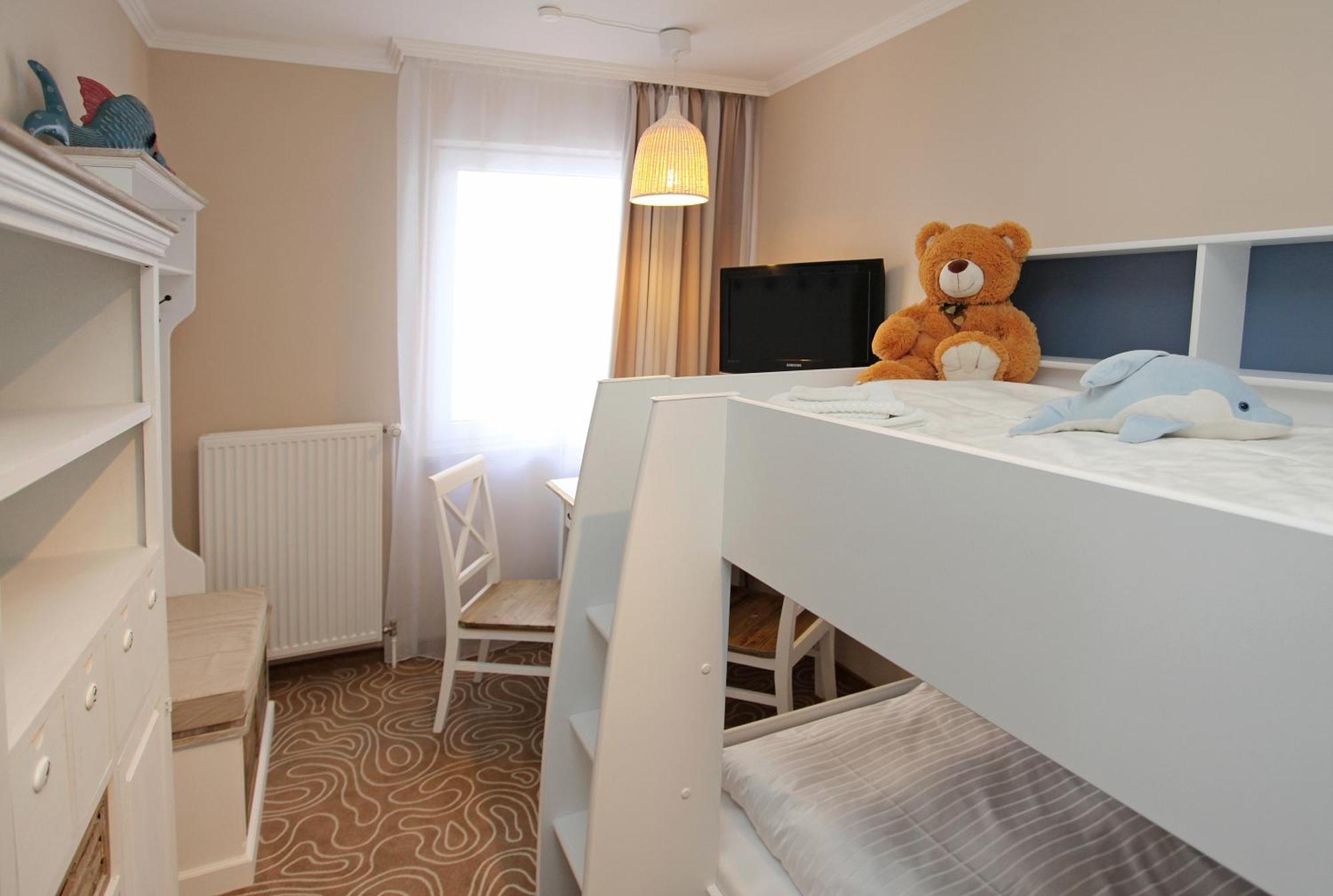 Familienzimmer (2 Erwachsene + 2 Kinder)