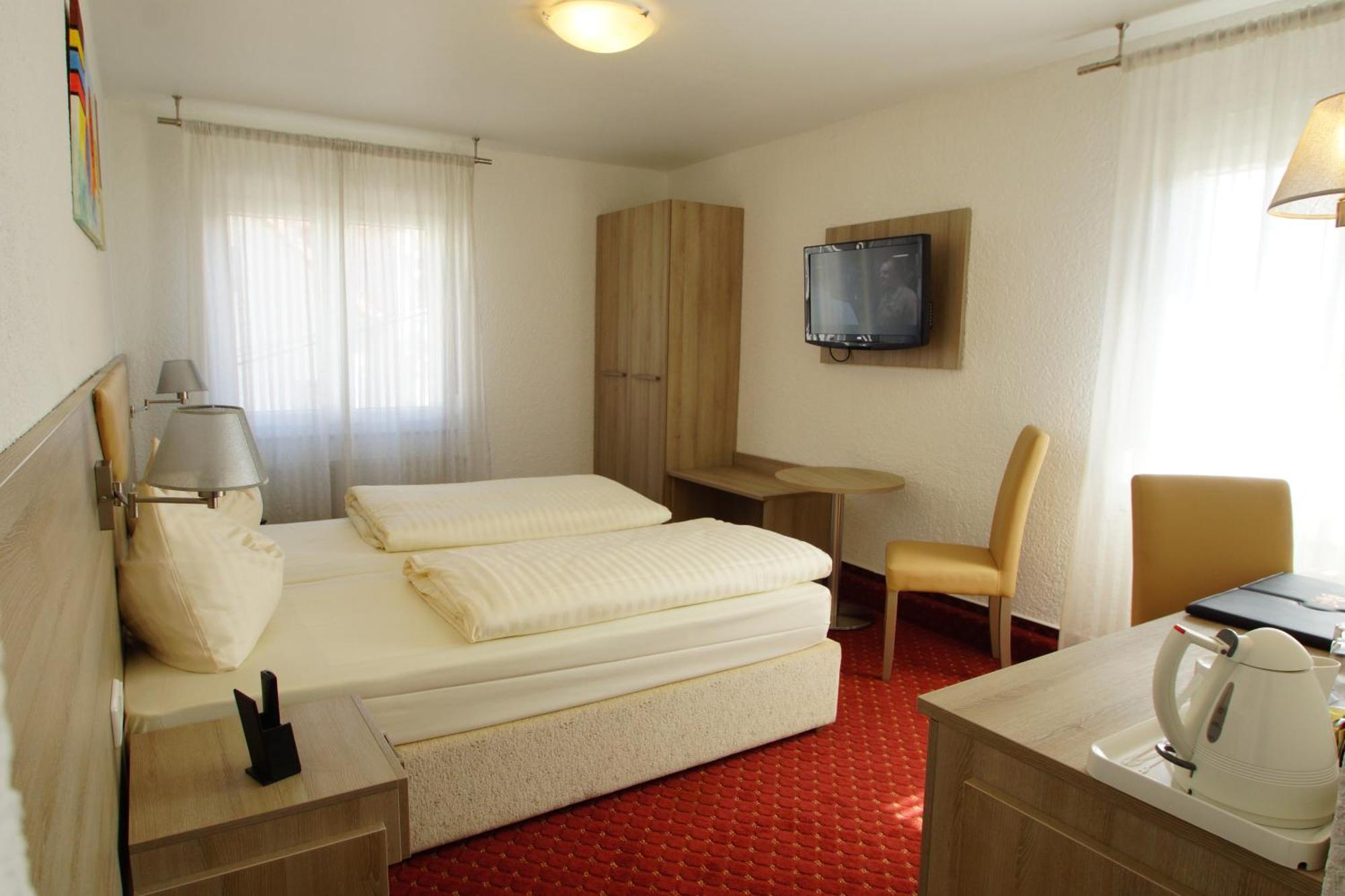 Classic Dreibettzimmer