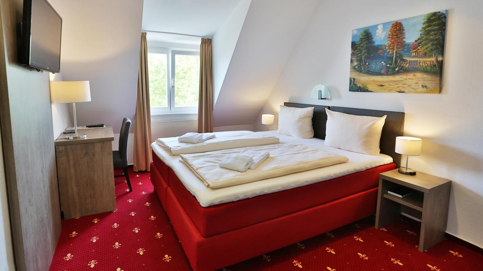 Doppel-/ Zweibettzimmer