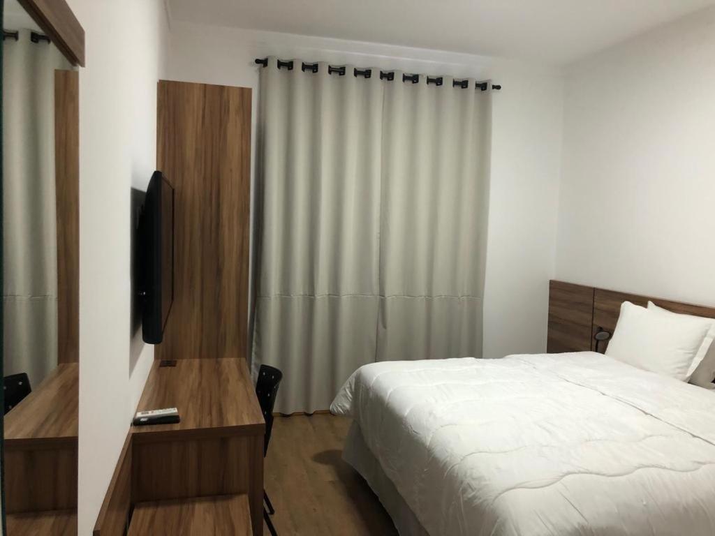 Quarto com Cama Queen-size