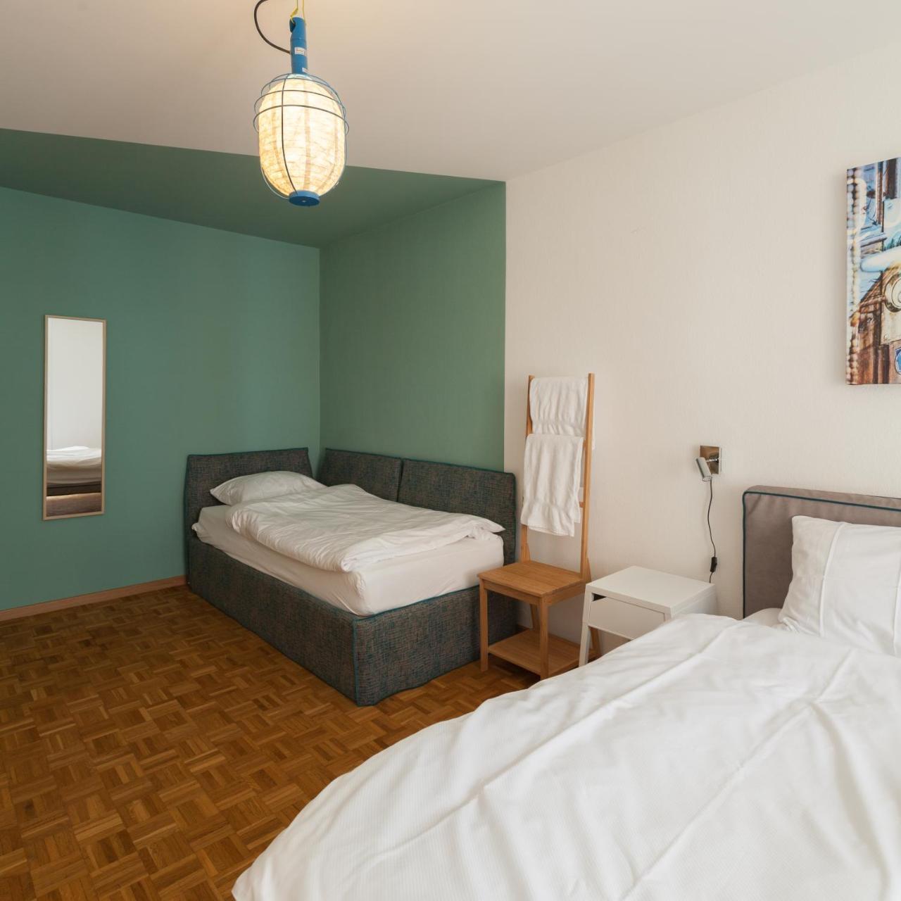 Chambre Triple avec Salle de Bains Commune