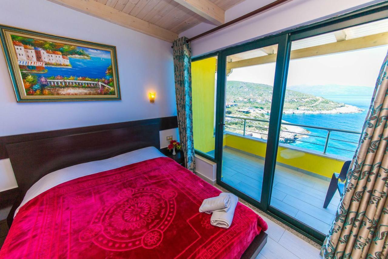 Superior Triple Room with Balcony and Sea View,813317370:JPEG