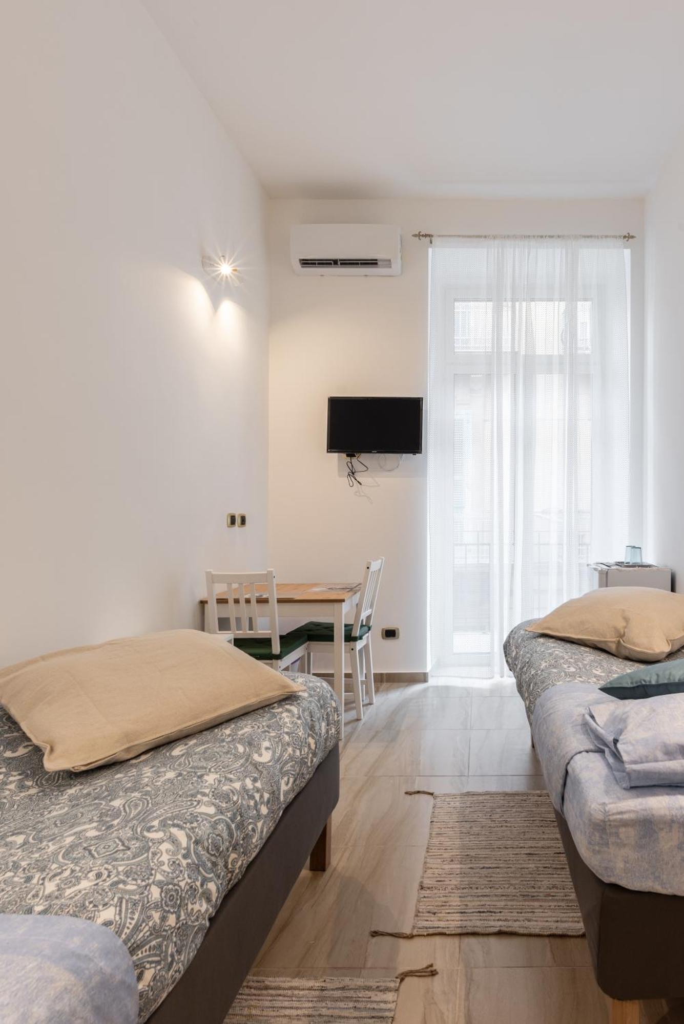 Chambre Lits Jumeaux avec Salle de Bains Privative Séparée
