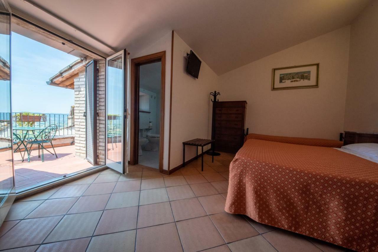 Camera Tripla con Balcone