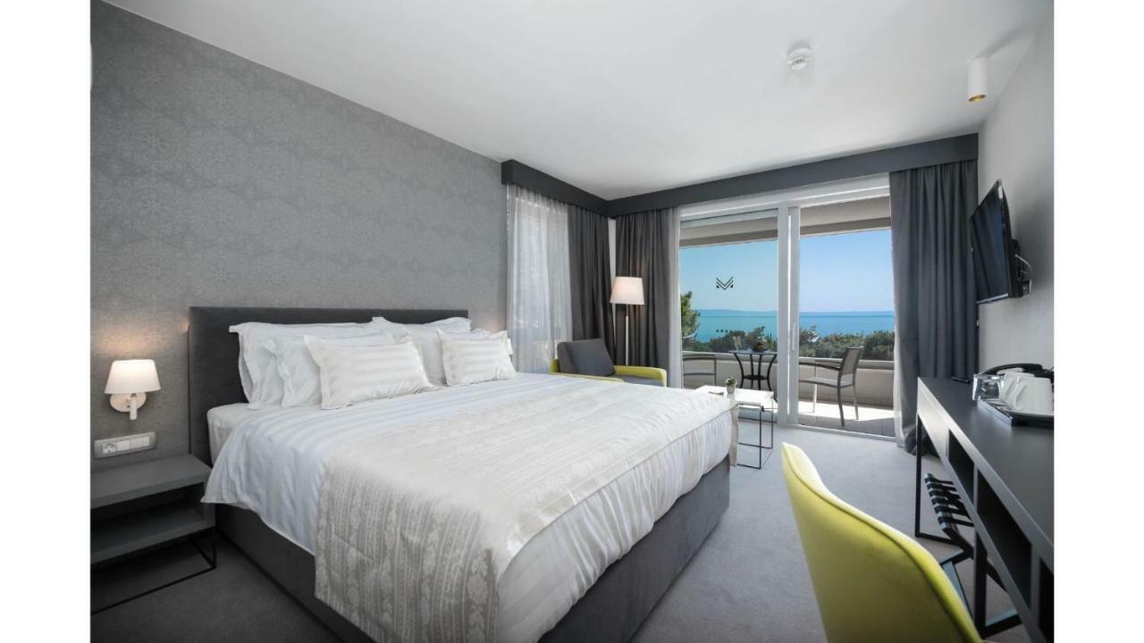 Deluxe tweepersoonskamer met balkon en uitzicht op zee