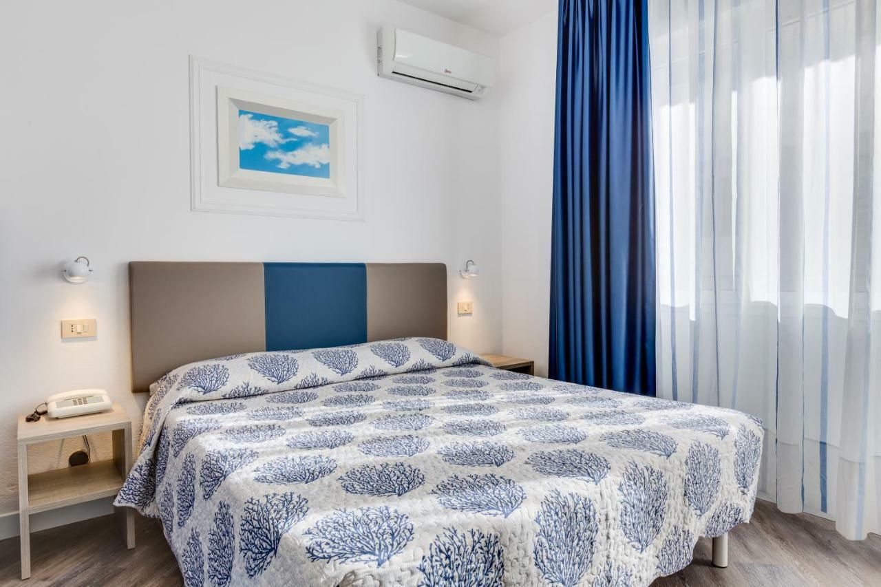 Comfort Dreibettzimmer mit Stadtblick
