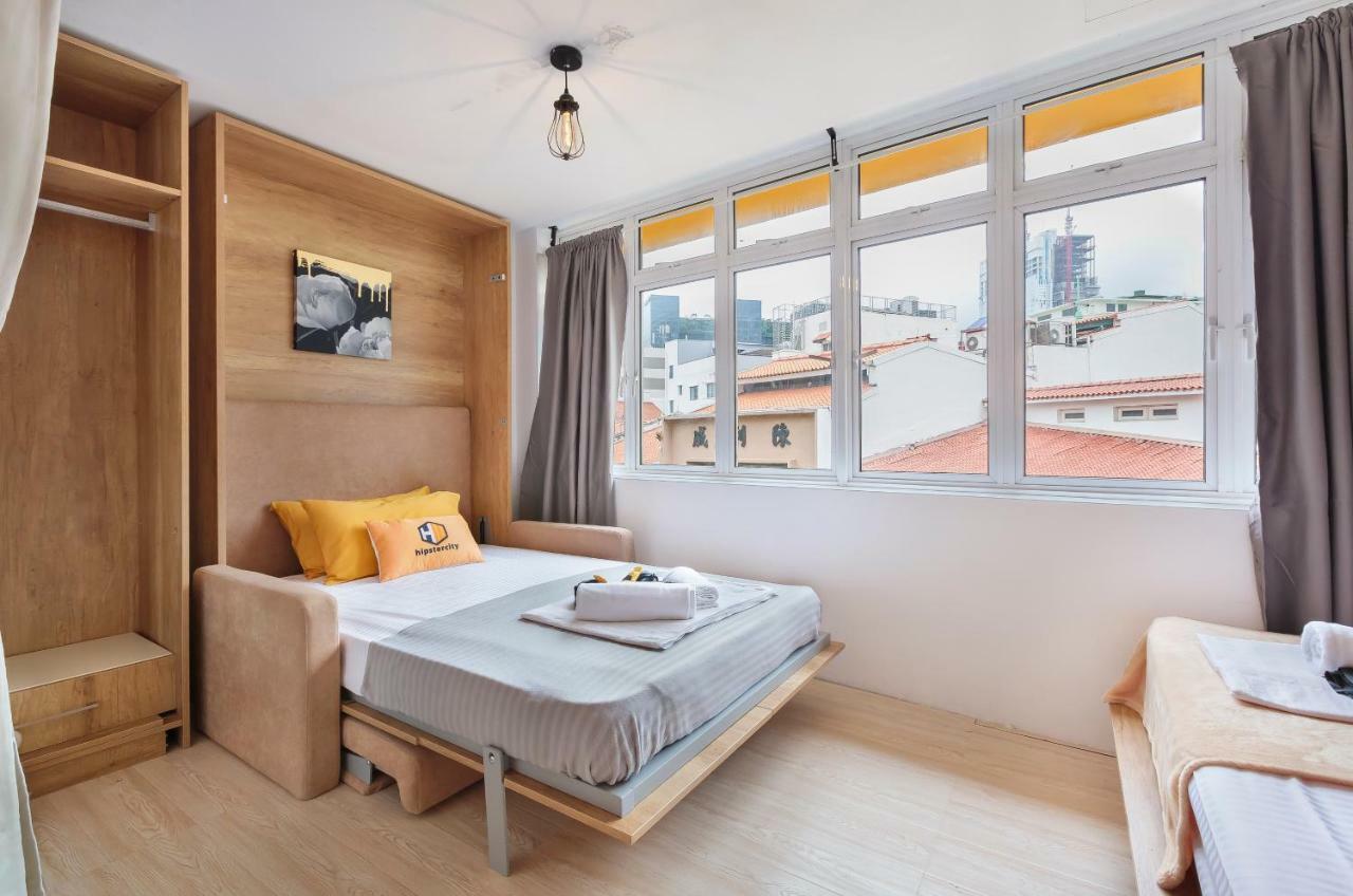 Quarto Triplo com Banheiro Compartilhado