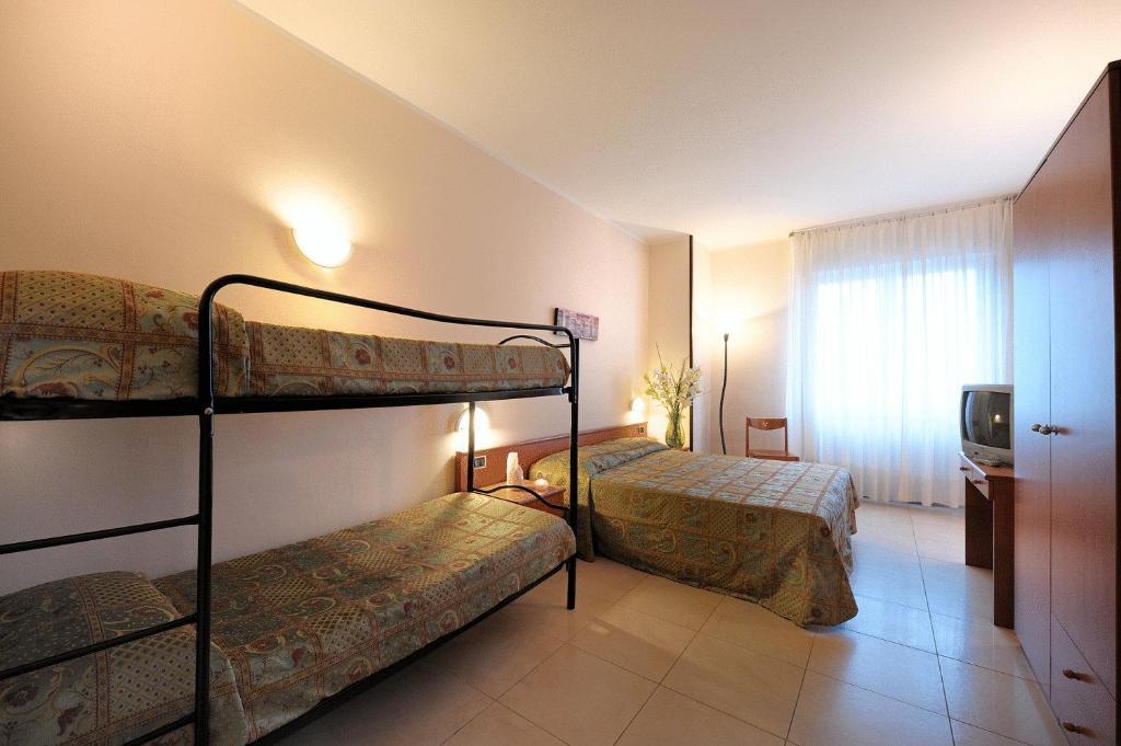 Habitación Doble con vistas al jardín, terraza y parque acuático