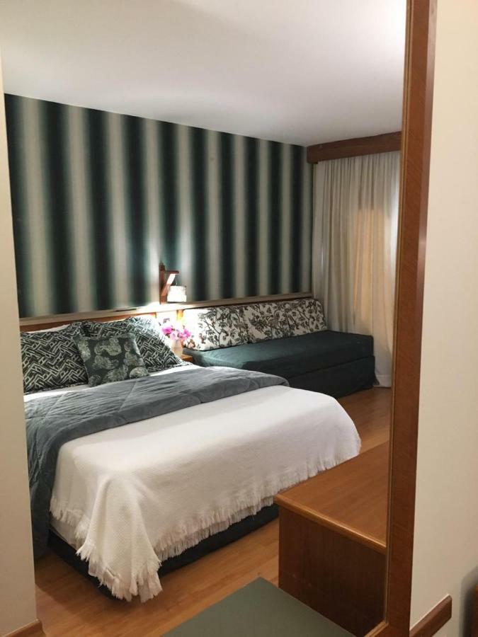 Quarto Quádruplo Premium