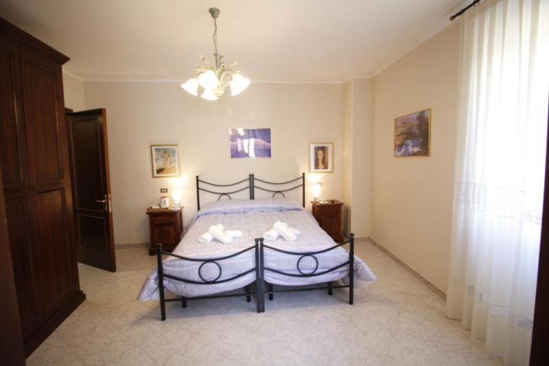 Camera Matrimoniale con Letto Supplementare