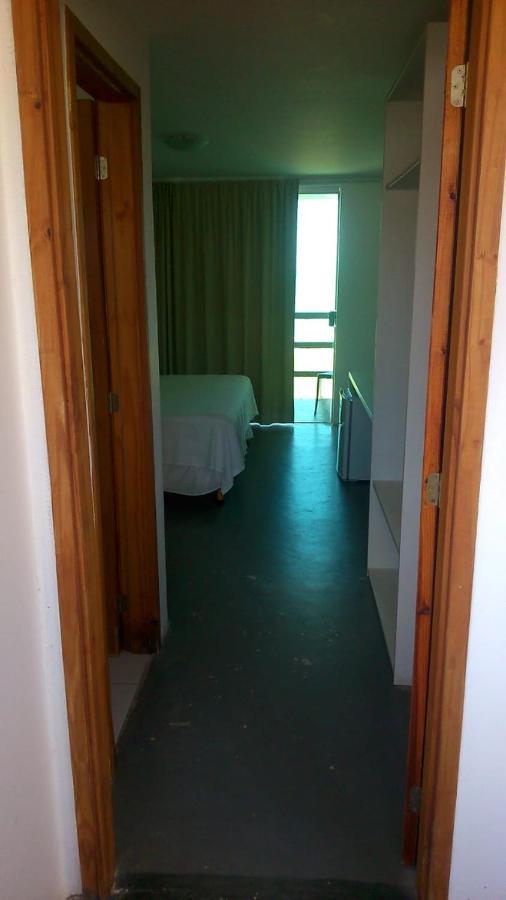 Quarto Quádruplo com Vista do Mar.