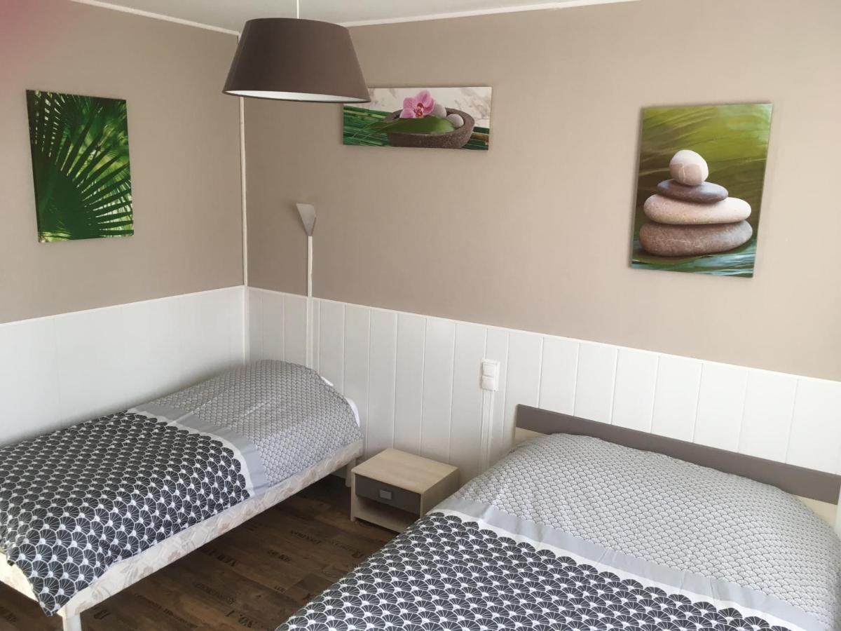 Chambre Triple avec Salle de Bains Commune