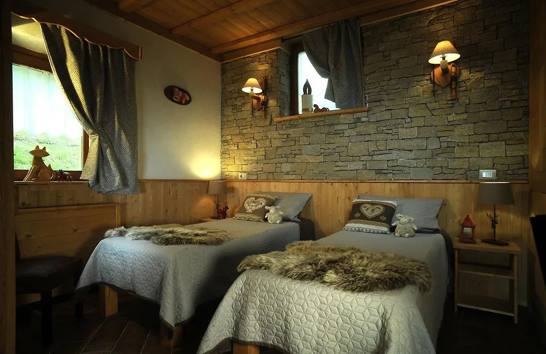 Aparthotel Foyer d'antan SUITE con caminetto hammam o vasca idromassaggio-1