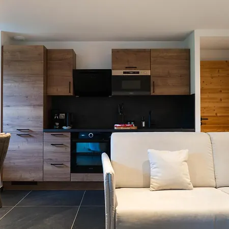 Géraniums Et Neige Fraîche, maison comtoise avec suites appartements de prestige, chambre tout confort, certaines avec spa et sauna privatifs au cœur du Jura à Métabief dans le Haut-Doubs-2