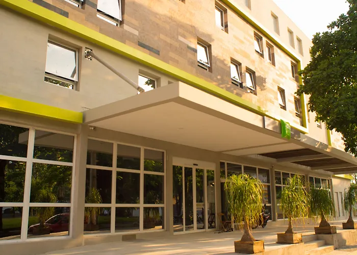 Golden Tulip Guarujá - Antigo Delphin Surf Hotel
