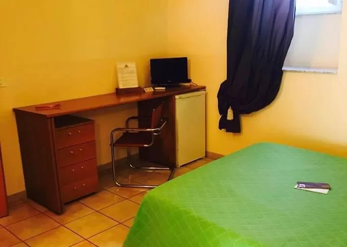 Corato room economy